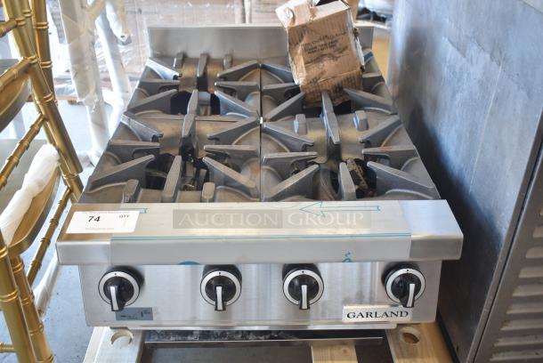 BRAND NEW SCRATCH AND DENT! Garland Stainless Steel Commercial Countertop Natural Gas Powered 4 Burner Range. - Image 1 of 9