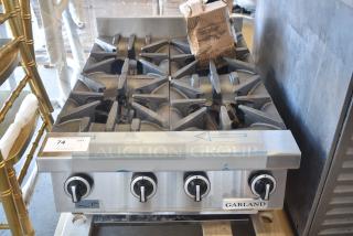 BRAND NEW SCRATCH AND DENT! Garland Stainless Steel Commercial Countertop Natural Gas Powered 4 Burner Range.