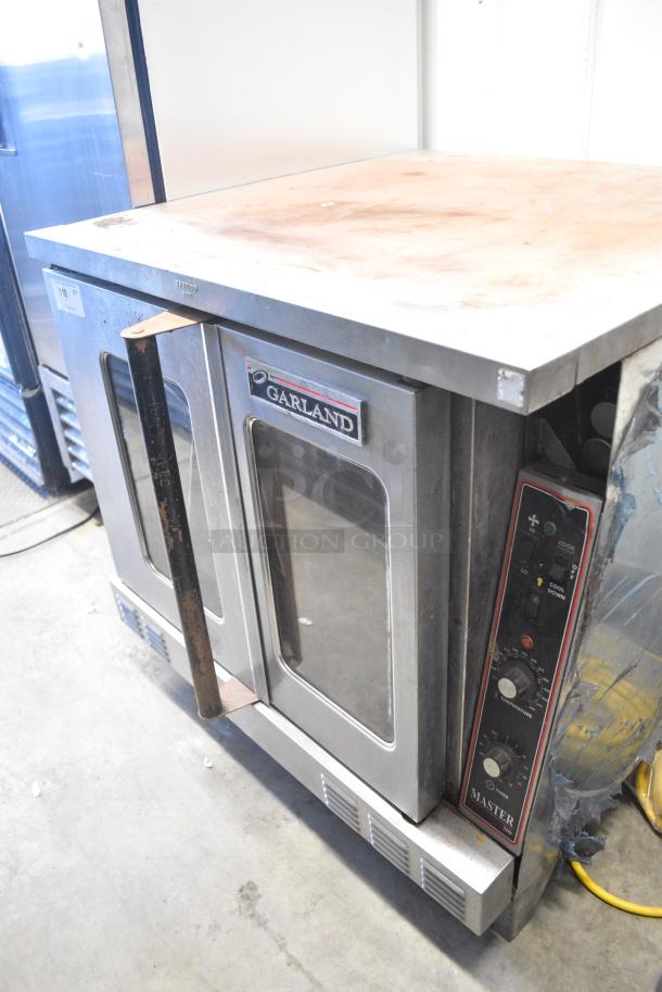 Garland Master 200 Stainless Steel Commercial Natural Gas Powered Full Size Convection Oven w/ View Through Doors, Metal Racks and Thermostatic Controls - Image 1 of 9
