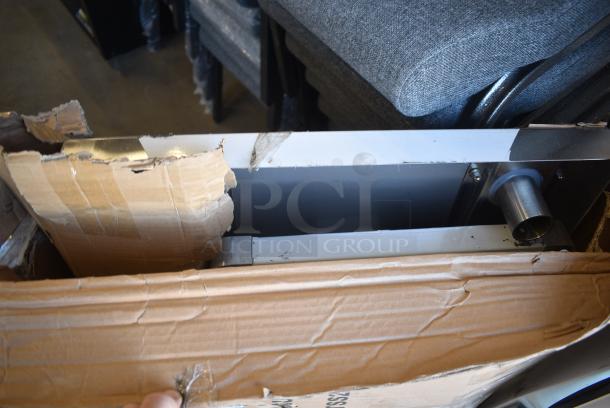 BRAND NEW SCRATCH AND DENT! Regency 600TSS2436S Spec Line 24" x 36" 14 Gauge Stainless Steel Commercial Work Table with Undershelf - Image 3 of 5