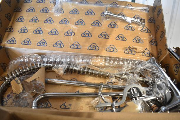 BRAND NEW SCRATCH AND DENT! 510B133AF12B T&S B-0133-ADF12-B EasyInstall Wall Mounted 37 9/16" High Pre-Rinse Faucet with Adjustable 8" Centers, 1.15 GPM Spray Valve, 44" Hose, 12" Add-On Faucet, and 6" Wall Bracket - Image 1 of 6