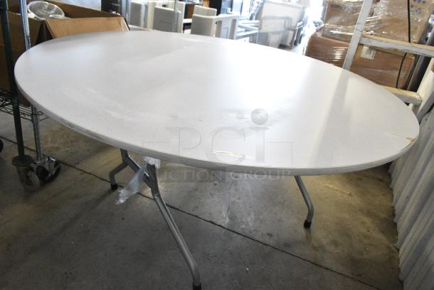 BRAND NEW SCRATCH AND DENT! Round Folding Table. - Image 1 of 4