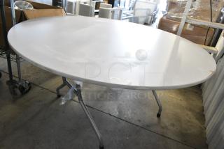 BRAND NEW SCRATCH AND DENT! Round Folding Table.