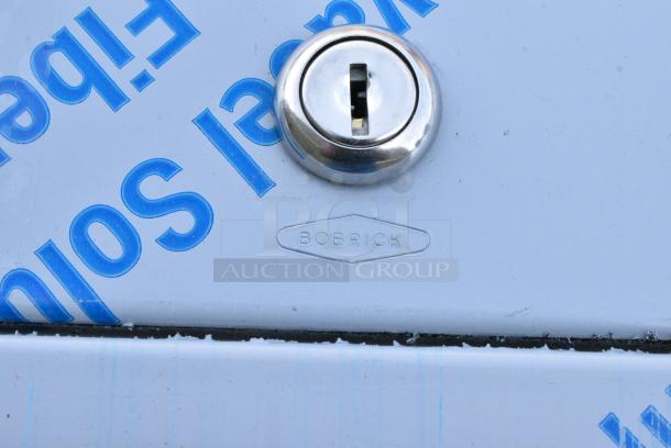 BRAND NEW SCRATCH AND DENT! Bobrick Stainless Steel Dispenser - Image 6 of 6