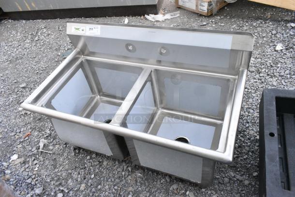 BRAND NEW SCRATCH AND DENT! Regency 600S21818 43" 16 Gauge Stainless Steel Two Compartment Commercial Sink with Stainless Steel Legs and Cross Bracing - 18" x 18" x 14" Bowls. No Legs. - Image 1 of 5