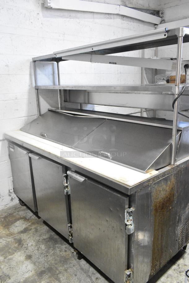 Leader ESLM72S/C Stainless Steel Commercial Sandwich Salad Prep Table Bain Marie Mega Top w/ 2 Over Shelves on Commercial Casters. 115 Volts, 1 Phase. Cannot Test Due To Cut Power Cord - Image 1 of 10