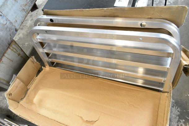 BRAND NEW SCRATCH AND DENT! Metal Pan Rack. May Be Missing Pieces. - Image 1 of 2
