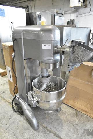 Hobart H-600 Metal Commercial Floor Style 60 Quart Planetary Dough Mixer w/ Stainless Steel Mixing Bowl. Dough Hook, Whisk and Pelican Head Attachments. 115/125 Volts, 1 Phase.