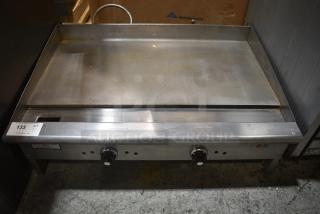 Cooking Performance Group CPG Stainless Steel Commercial Propane Gas Powered Flat Top Griddle.
