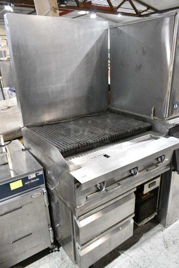 Southbend Stainless Steel Commercial Gas Powered Charbroiler Grill w/ 2 Drawer Chef Base and Back Splash on Commercial Casters. Tested and Powers On But Does Not Get Cold - Image 1 of 5