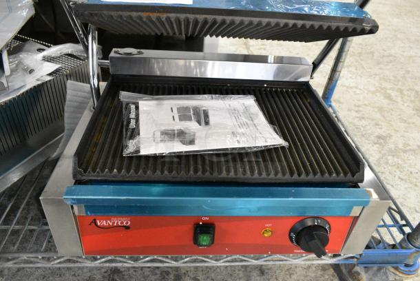 BRAND NEW SCRATCH AND DENT! 2024 Avantco 177PG200 Commercial Panini Sandwich Grill with Smooth Plates and 13 3/8" x 8 3/4" Cooking Surface. 120 Volts, 1 Phase. Tested and Working! - Image 2 of 4