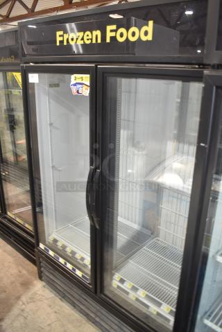 2018 True GDM-49F-HC Metal Commercial 2 Door Reach In Freezer Merchandiser w/ Poly Coated Racks. 115/208-230 Volts, 1 Phase. Tested and Working!