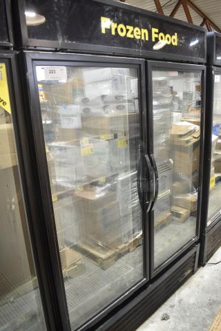 2017 True GDM-49F-HC Metal Commercial 2 Door Reach In Freezer Merchandiser w/ Poly Coated Racks. 115/208-230 Volts, 1 Phase. Tested and Working!