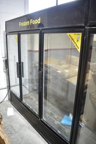True GDM-72F-LD Metal Commercial 3 Door Reach In Freezer Merchandiser w/ Poly Coated Racks. 115/208-230 Volts, 1 Phase. Tested and Working!