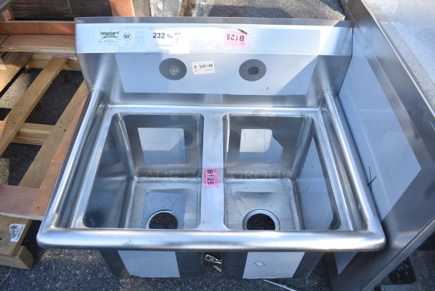 BRAND NEW SCRATCH AND DENT! Regency 600S21014 27" 16-Gauge Stainless Steel Two Compartment Commercial Sink with Galvanized Steel Legs and without Drainboard - 10" x 14" x 12" Bowls. No Legs. - Image 1 of 5