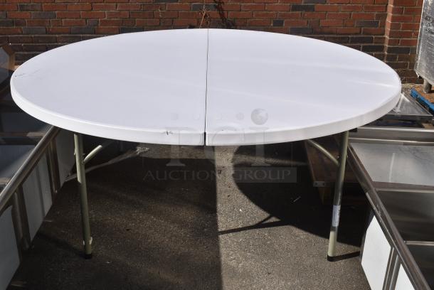 BRAND NEW SCRATCH AND DENT! White Round Folding Table. - Image 1 of 5