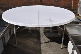BRAND NEW SCRATCH AND DENT! White Round Folding Table.