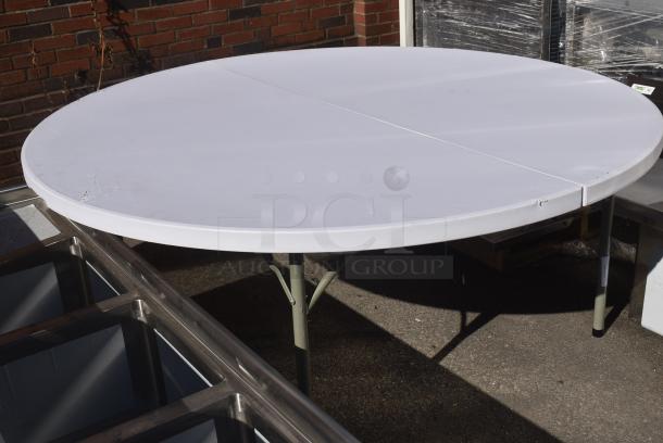 BRAND NEW SCRATCH AND DENT! White Round Folding Table. - Image 2 of 5