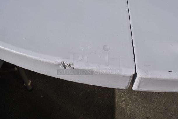 BRAND NEW SCRATCH AND DENT! White Round Folding Table. - Image 4 of 5