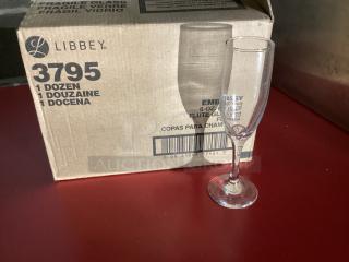 New! Embassy Clear 6oz flute glasses 
Qty 12
Your Bid x 12