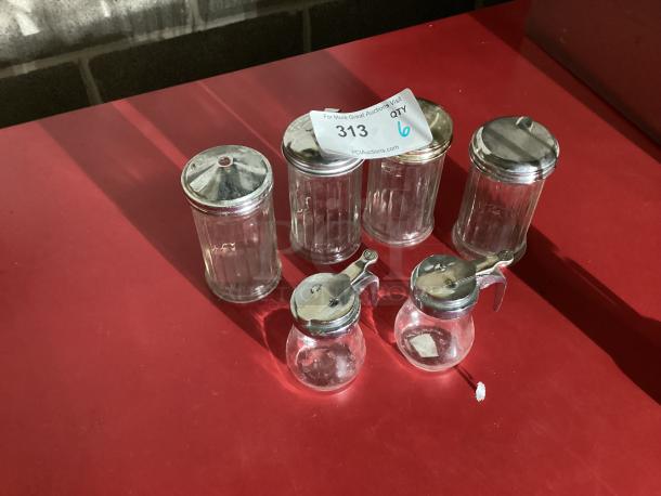 Creamer/Sugar Pourers 
Qty 4
Glass Syrup Dispensers 
Qty 2
Your Bid x 6 - Image 1 of 1