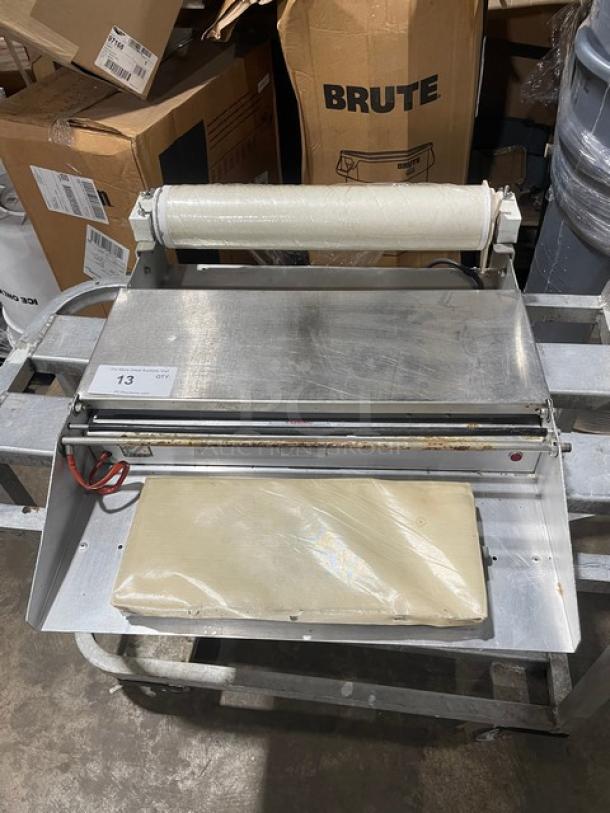 Commercial Stainless Steel Electric Powered Countertop Axle Mounted Single Roll Heated Food Wrapping Machine! With Thermostatically Controlled Hot Plate & Replaceable Non-Stick Cover! Working When Removed! - Image 1 of 7