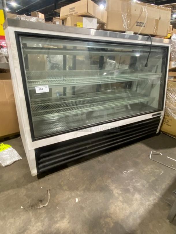 True Commercial White Slanted Glass Refrigerated Serve-Over Deli Meat Merchandiser Display Showcase! With Poly Coated Wire Racks! With Rear Access Triple Sliding Glass Doors! Model: TSID-72-3 SN: 1-4377737! 115V 1 Phase! On Casters! - Image 1 of 8