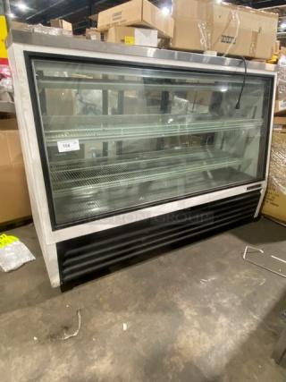 True Commercial White Slanted Glass Refrigerated Serve-Over Deli Meat Merchandiser Display Showcase! With Poly Coated Wire Racks! With Rear Access Triple Sliding Glass Doors! Model: TSID-72-3 SN: 1-4377737! 115V 1 Phase! On Casters!