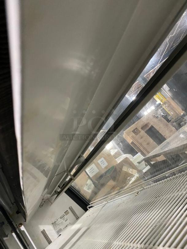 True Commercial White Slanted Glass Refrigerated Serve-Over Deli Meat Merchandiser Display Showcase! With Poly Coated Wire Racks! With Rear Access Triple Sliding Glass Doors! Model: TSID-72-3 SN: 1-4377737! 115V 1 Phase! On Casters! - Image 6 of 8