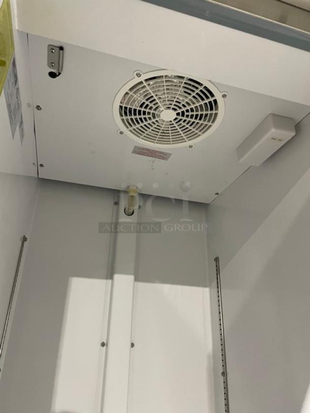 LIKE NEW! Arctic Air Commercial Stainless Steel Solid Single Door Reach In Freezer! With Poly Coated Wire Rack! Model: AF23 SN: H8157523! 115V! On casters! - Image 7 of 11
