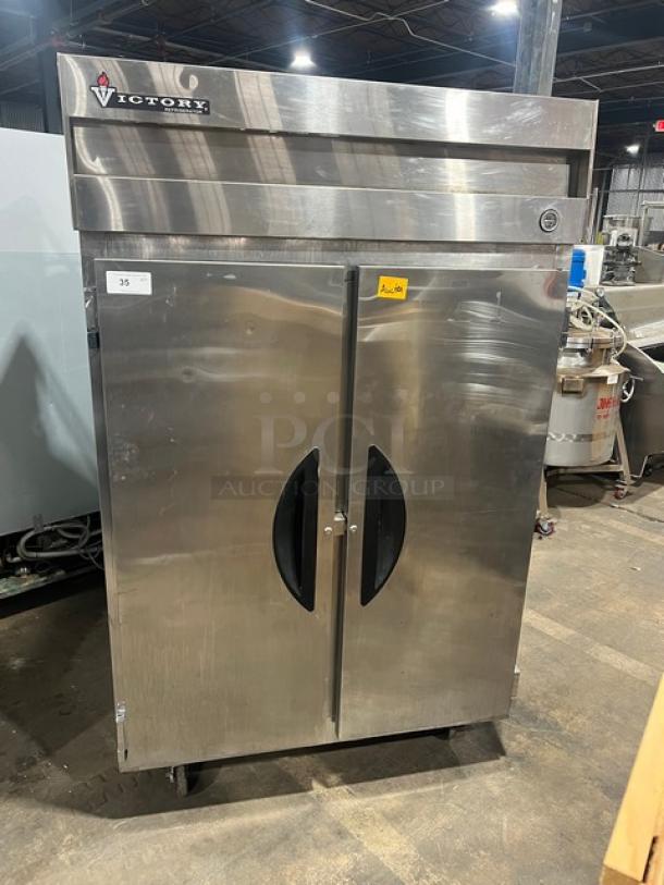 Victory Commercial Stainless Steel Solid 2 Door Reach In Refrigerator! With Adjustable Poly Coated Wire Racks! Model: VR-2 SN: E0975386! 115V 1 Phase! On Casters! - Image 1 of 9