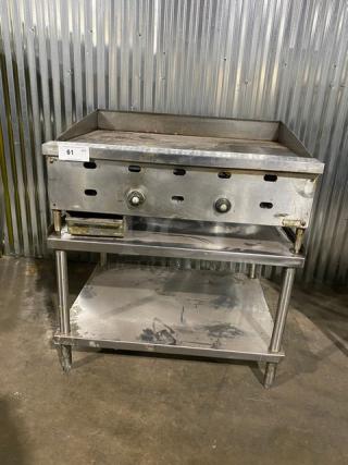 Commercial Stainless Steel Natural Gas Powered Countertop Flat Griddle! With Thermostatic Controls! With Back & Side Splash! With Single Shelf Equipment Stand! On Legs! Working When Removed!