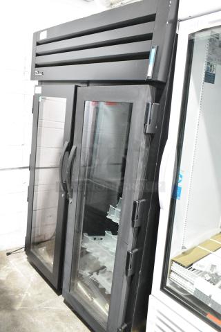 LIKE NEW! 2023 True STG2RPTVLD-2G-2S-HC Metal Commercial 2 Door Reach In Cooler Merchandiser. 115 Volts, 1 Phase. Tested and Working!
