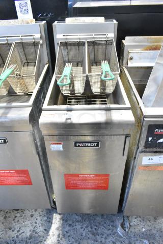 Imperial FM-90/NG Stainless Steel Commercial Floor Style Natural Gas Powered Deep Fat Fryer w/ 2 Metal Fry Baskets on Commercial Casters. 90,000 BTU.