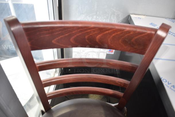 BRAND NEW SCRATCH AND DENT! Lancaster Table & Seating 164BWLMVDBAS Mahogany Finish Wood Ladder Back Bar Stool with Dark Brown Vinyl Seat - Assembled - Image 3 of 5