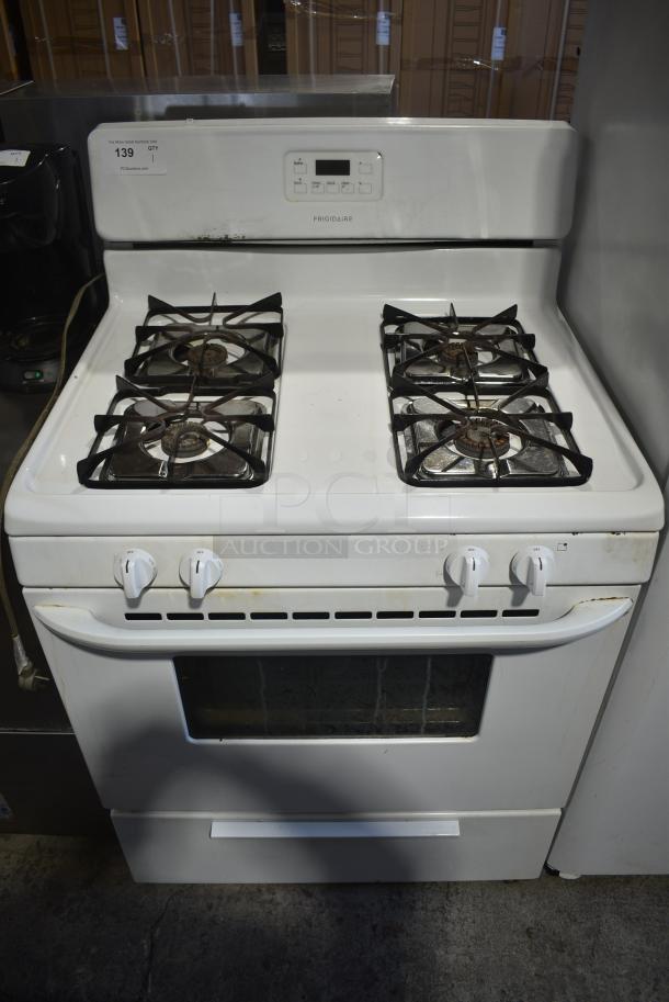 Frigidaire FFGF3015LWF Metal Natural Gas Powered 4 Burner Range w/ Oven. - Image 1 of 10