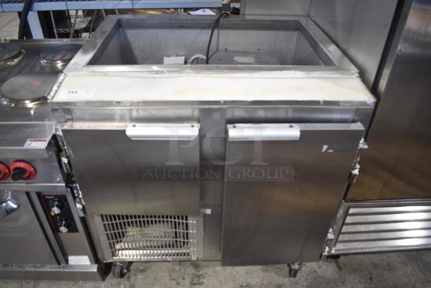 Leader LM36 S/C Stainless Steel Commercial Prep Table on Commercial Casters. 115 Volts, 1 Phase. Tested and Powers On But Does Not Get Cold - Image 1 of 10