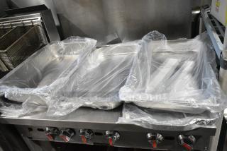 4 BRAND NEW SCRATCH AND DENT! Items Including Chafer Frame and Stainless Steel Drop In Bins.  4 Times Your Bid!