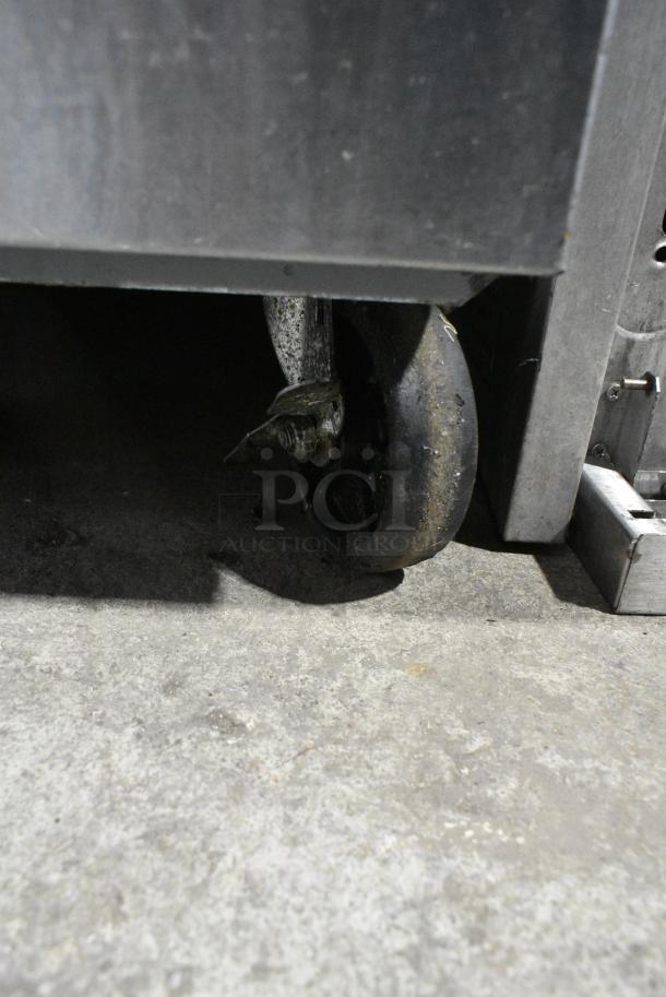 Asber Stainless Steel Commercial Floor Style Natural Gas Powered Deep Fat Fryer w/ 2 Metal Fry Baskets on Commercial Casters. - Image 3 of 7