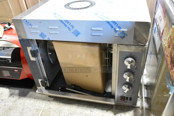 BRAND NEW SCRATCH AND DENT! Cooking Performance Group CPG Stainless Steel Commercial Countertop Electric Powered Rotisserie Oven. 240 Volts, 1 Phase. - Image 2 of 4