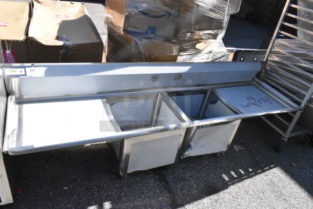 BRAND NEW SCRATCH AND DENT! Regency 600S21818224 124" 16-Gauge Stainless Steel Three Compartment Commercial Sink with 2 Drainboards - 24" x 24" x 14" Bowls. No Legs. - Image 1 of 7