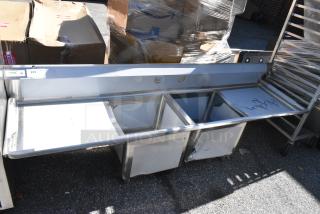 BRAND NEW SCRATCH AND DENT! Regency 600S21818224 124" 16-Gauge Stainless Steel Three Compartment Commercial Sink with 2 Drainboards - 24" x 24" x 14" Bowls. No Legs.