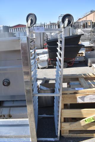 BRAND NEW SCRATCH AND DENT! 1505 Metal Commercial Pan Transport Rack on Commercial Casters. Missing 1 Caster.