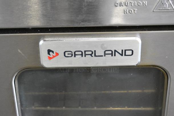 LIKE NEW!  Garland Master 200 Stainless Steel Commercial Electric Powered Half Size Convection Oven w/ View Through Door, Metal Oven Racks and Thermostatic Controls. 208/240 Volts, 1 Phase. - Image 2 of 5