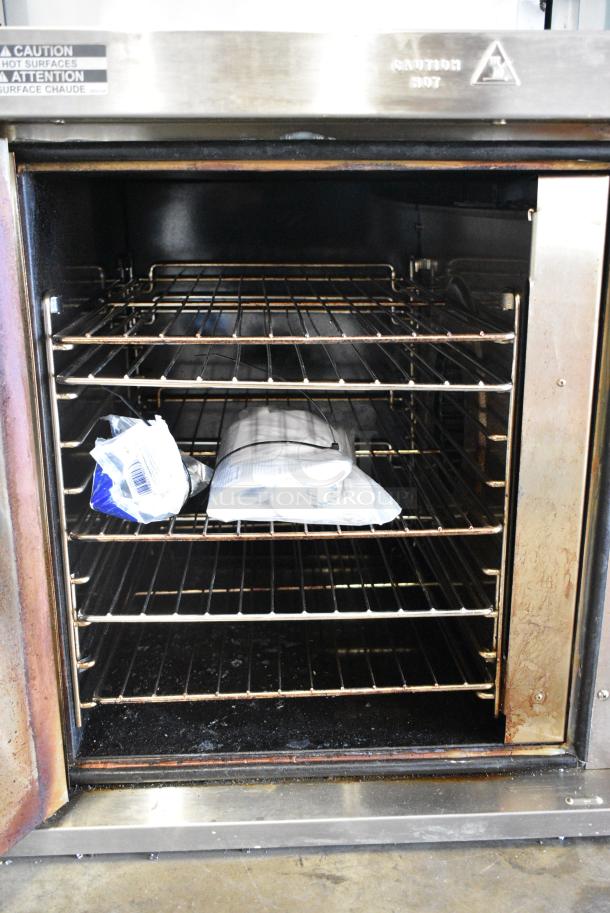 LIKE NEW!  Garland Master 200 Stainless Steel Commercial Electric Powered Half Size Convection Oven w/ View Through Door, Metal Oven Racks and Thermostatic Controls. 208/240 Volts, 1 Phase. - Image 4 of 5