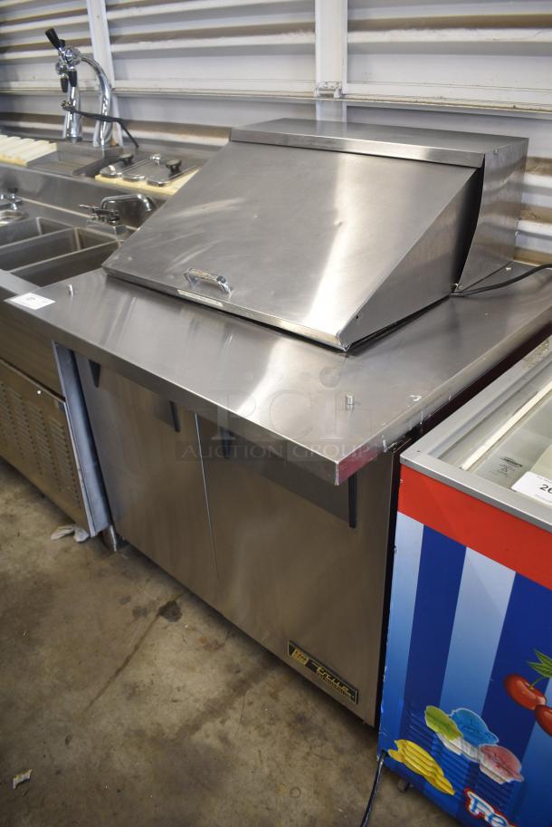 True TSSU-36-12M-B Stainless Steel Commercial Sandwich Salad Prep Table Bain Marie Mega Top on Commercial Casters. 115 Volts, 1 Phase. Tested and Powers On But Does Not Get Cold - Image 1 of 11