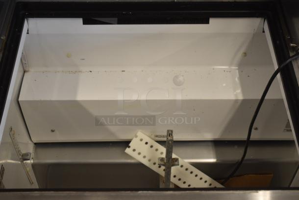 True TSSU-36-12M-B Stainless Steel Commercial Sandwich Salad Prep Table Bain Marie Mega Top on Commercial Casters. 115 Volts, 1 Phase. Tested and Powers On But Does Not Get Cold - Image 7 of 11