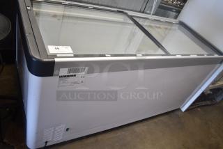 2021 Liebherr Metal Commercial Chest Freezer Merchandiser. Does Not Have Doors. 115-127 Volts, 1 Phase. Tested and Powers On But Does Not Get Cold
