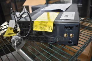 APC BX1350M Uninterruptible Power Supply. 120 Volts, 1 Phase.