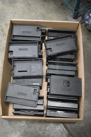 Box of Nintendo Switch Charging Bases.